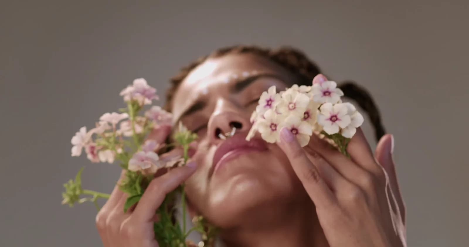 A figure wearing a flower crown, from the supplied academic film.